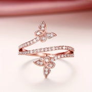 Anillo con mariposas y circonitas engastadas en oro blanco