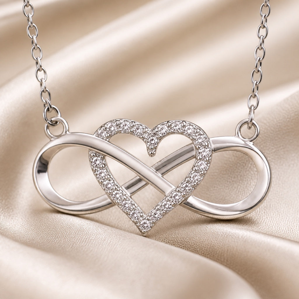 Collar con colgante de corazón infinito de oro blanco