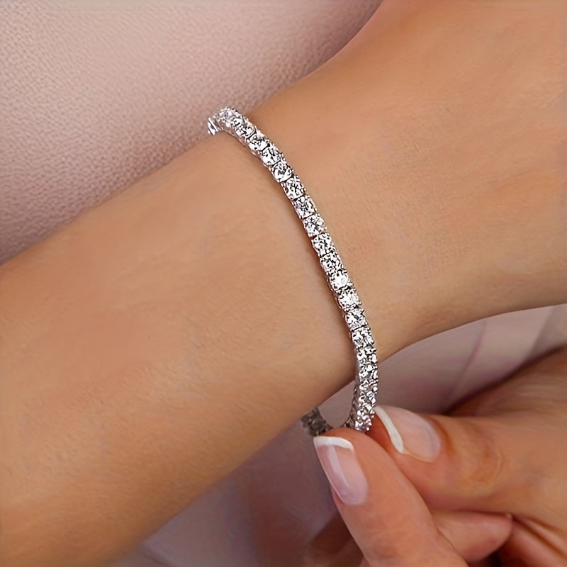 Pulsera tennis de oro blanco y cristales