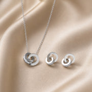 Anillo infinito de oro blanco