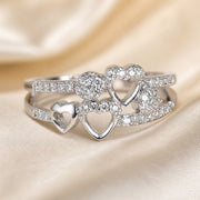 Anillo de corazón en oro blanco con circonita