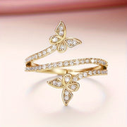 Anillo con mariposas y circonitas engastadas en oro blanco