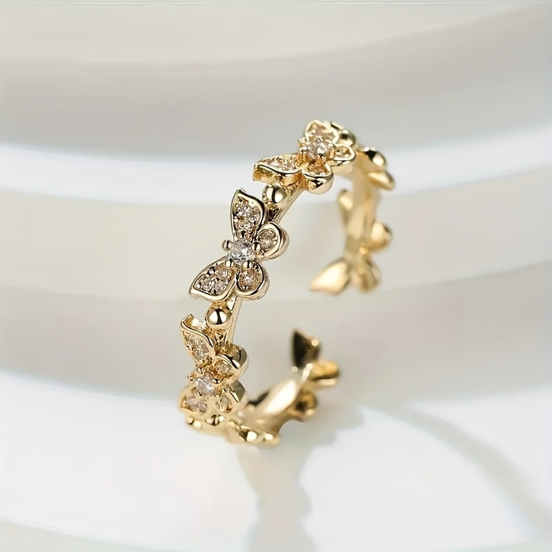 Anillo con forma de mariposa de oro blanco con cristales