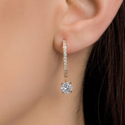 Pendientes de oro blanco con moissanita de talla redonda
