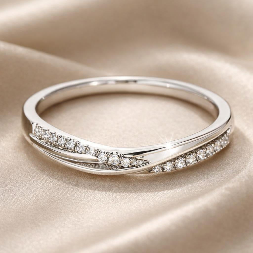 Anillo de día de circonita y oro blanco