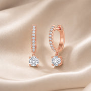 Pendientes de oro blanco con moissanita de talla redonda