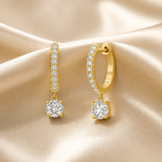 Pendientes de oro blanco con moissanita de talla redonda